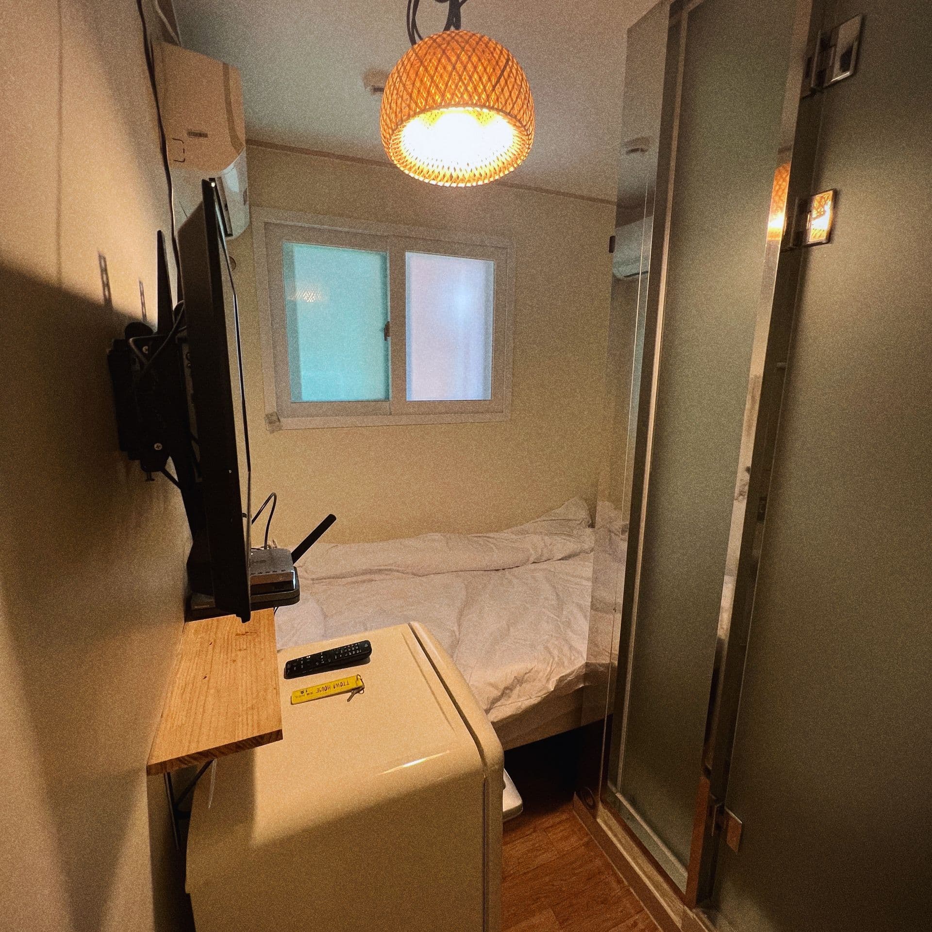 Compact Myeongdong Base with Shared Kitchen and Laundry